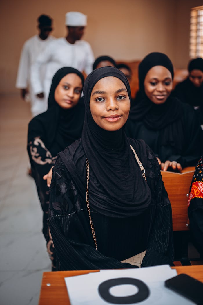 confident-muslim-students-in-classroom-setting-32668037